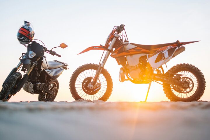 selective-focus-photography-of-two-white-and-black-dual-sport-motorcycles