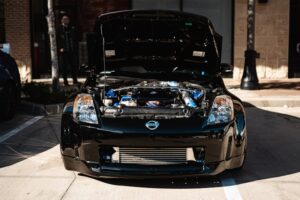 black-nissan-parked-on-street